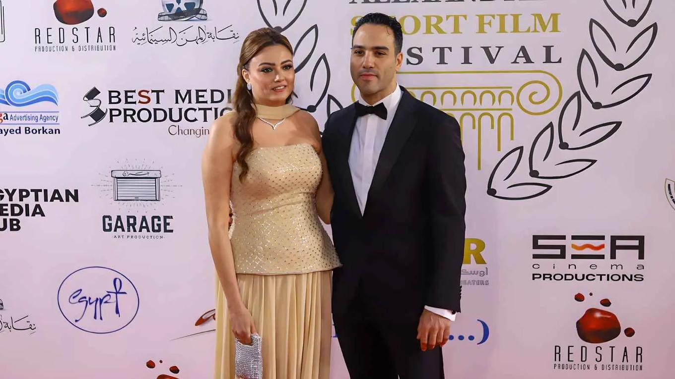 بشرى وزوجها في حفل افتتاح مهرجان الإسكندرية للفيلم القصير